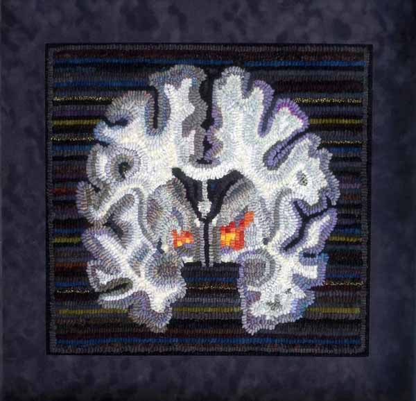  Marjorie Taylor "Warm Glow" (showing the brain activation that underlies altruistic behavior) 2013. Rug hooking. Photo courtesy of the artist.
