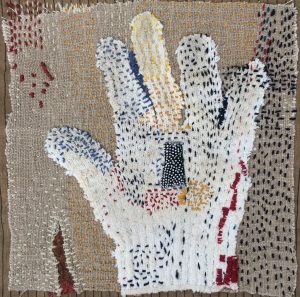 Helen Geglio, "Reach," Found cotton glove, wool embroidery on linen, "10" x 10" x 1.5," 2019, website: www.helengeglio.com